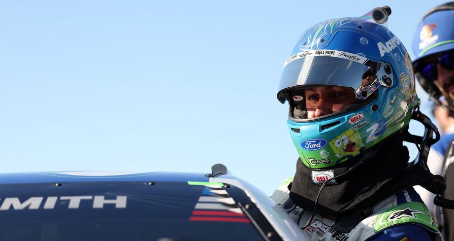 Zane Smith climbs into his car at Michigan.