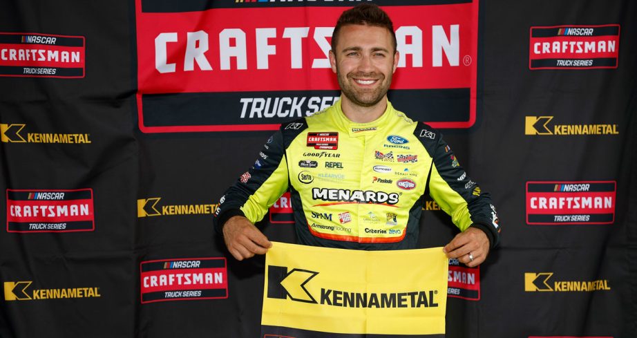Ty Majeski poses for a photo following his pole victory at Michigan Interntional Speedway.