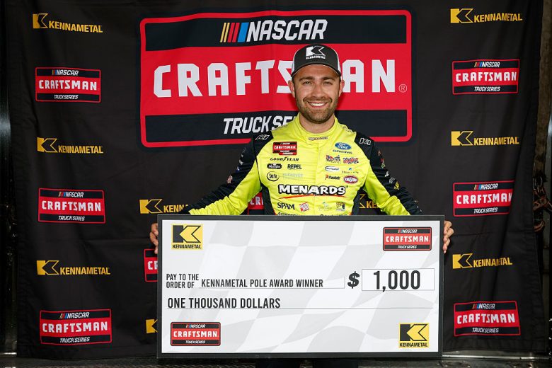 Ty Majeski poses for a photo following his pole victory at Michigan Interntional Speedway.