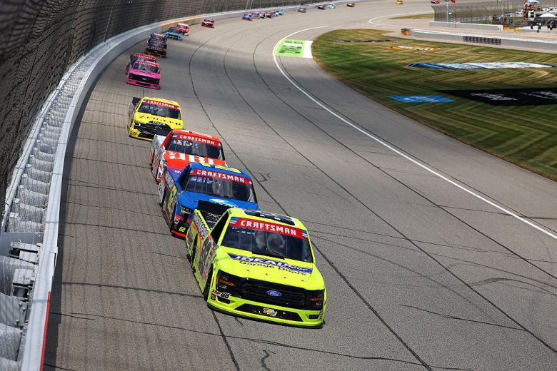 NASCAR Craftsman Truck Series trucks race at Michigan.