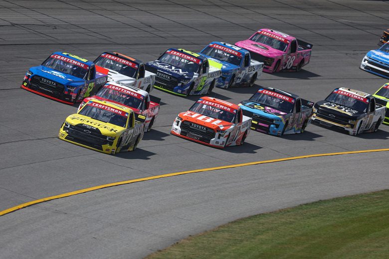 NASCAR Craftsman Truck Series trucks race at Michigan.