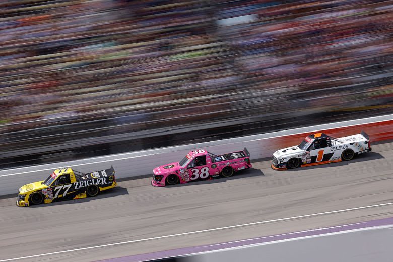 NASCAR Craftsman Truck Series trucks race at Michigan.