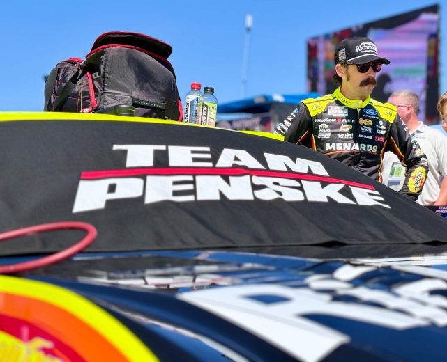 Ryan Blaney looks on before a NASCAR Cup Series race at Michigan.