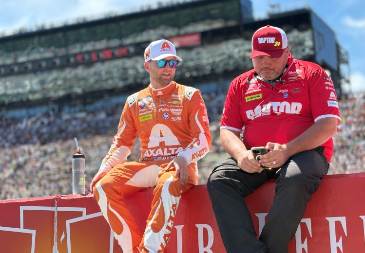 William Byron and crew chief Rudy Fugle sit on pit wall at Michigan.