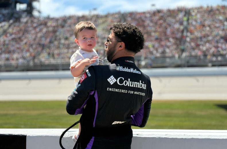 Bubba Wallace and son Becks at Michigan International Speedway.