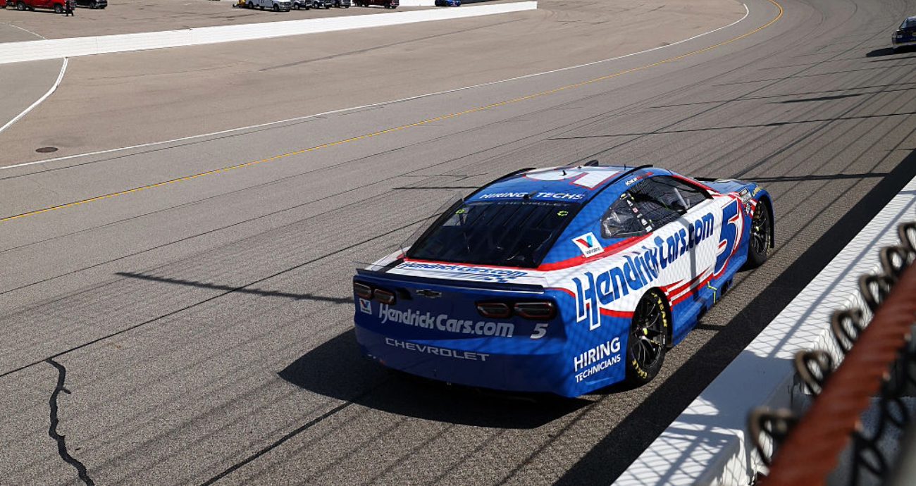 Kyle Larson drives at Michigan.