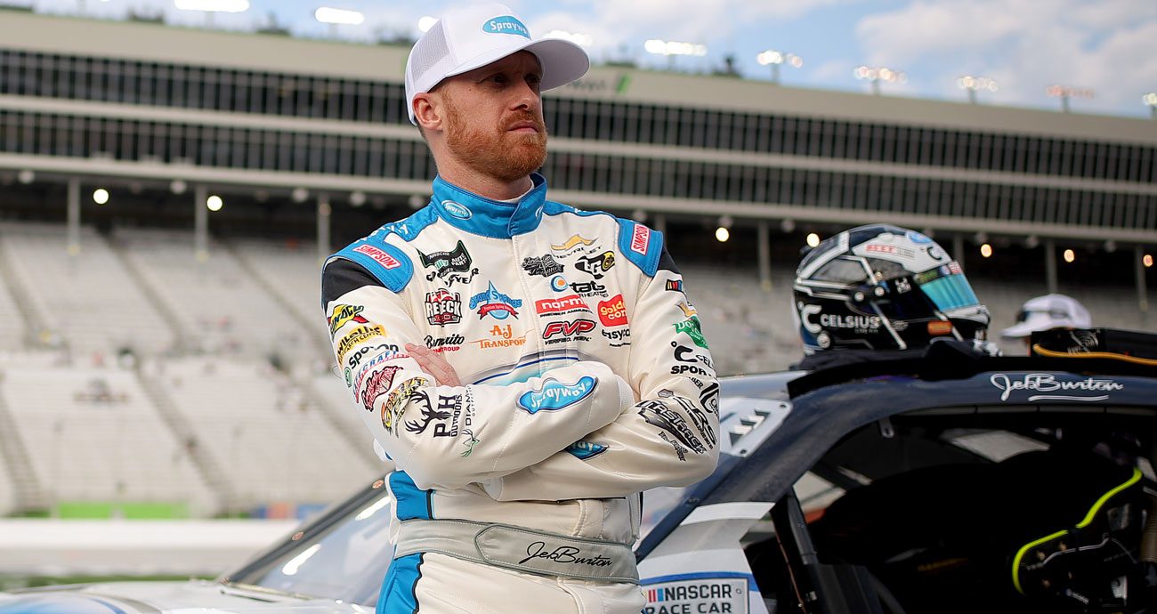 Jeb Burton looks on.