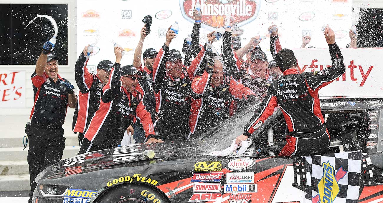 Jeremy Clements celebrates with his No. 51 crew after his first O'Reilly Auto Parts Series win at Road America in 2017.