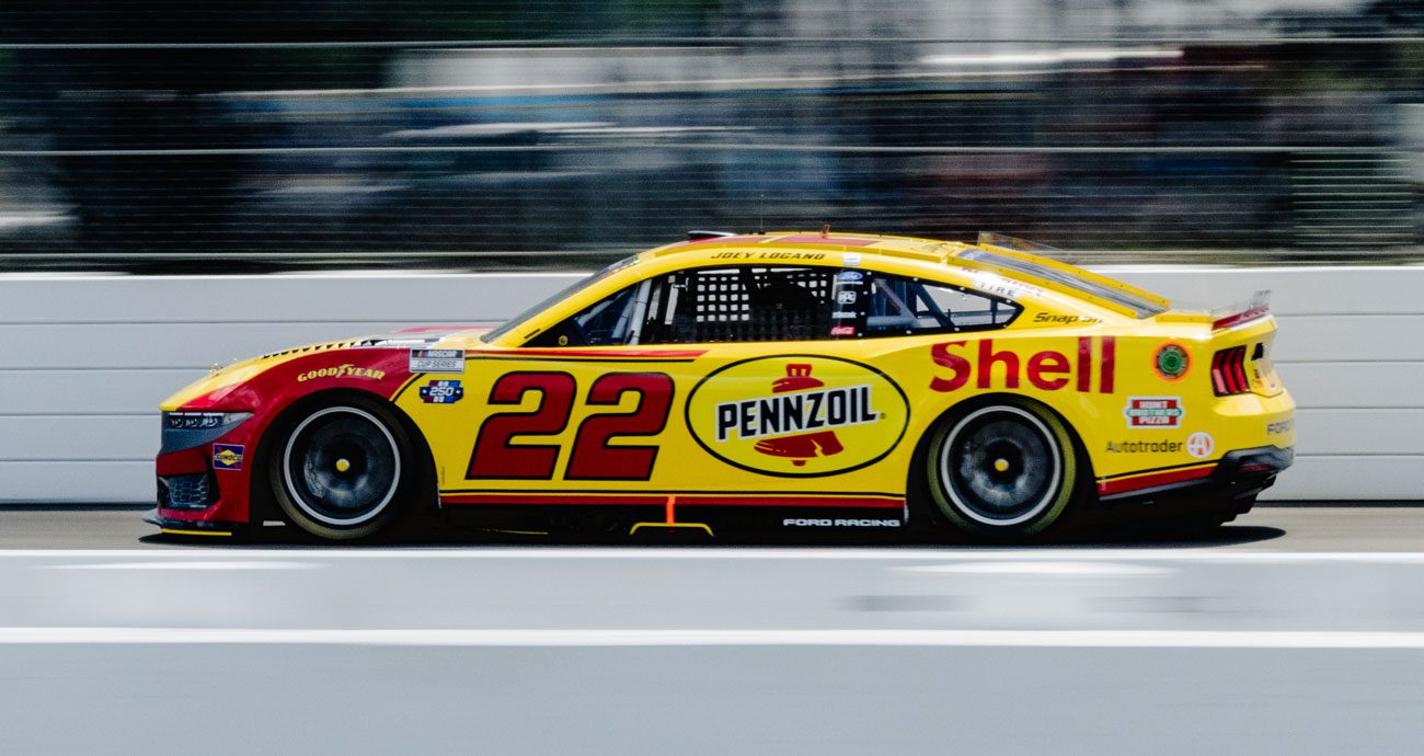Joey Logano drives at Pocono.
