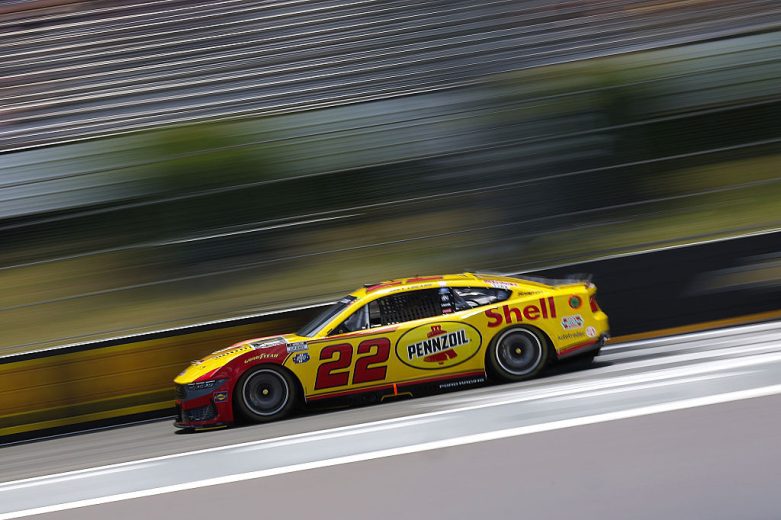 Joey Logano drives at Pocono.