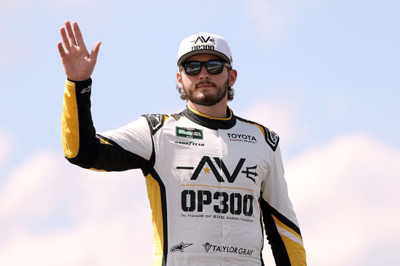 Taylor Gray waves to fans.