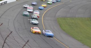 Promo Image for Kyle Larson takes lead on opening lap at Pocono
