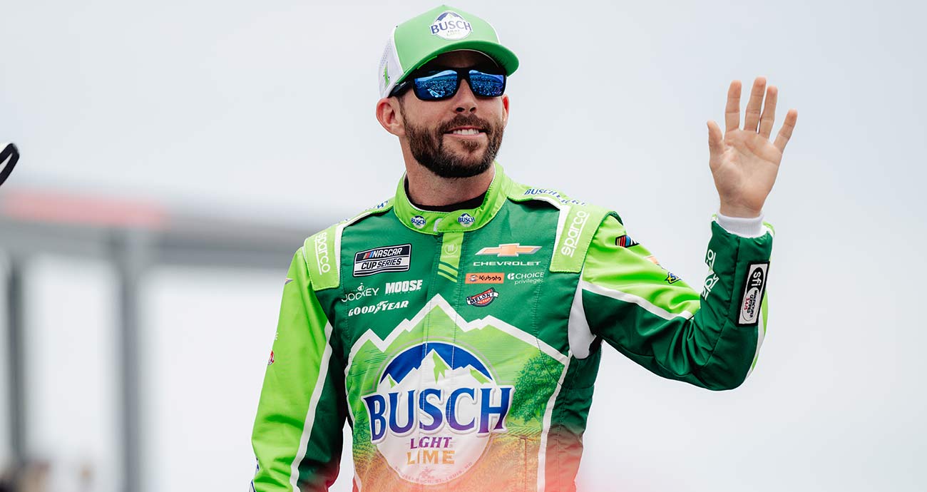 Ross Chastain waves to fans during driver introductions at Pocono Raceway