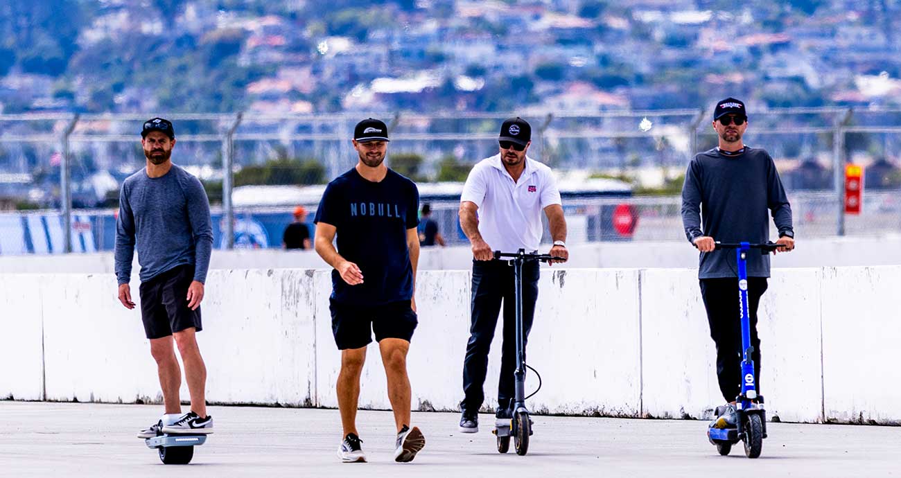Todd Gilliland and his family and crew tour the Naval Base Coronado street circuit on Thursday's track walk.