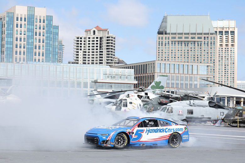 Kyle Larson does a burnout.