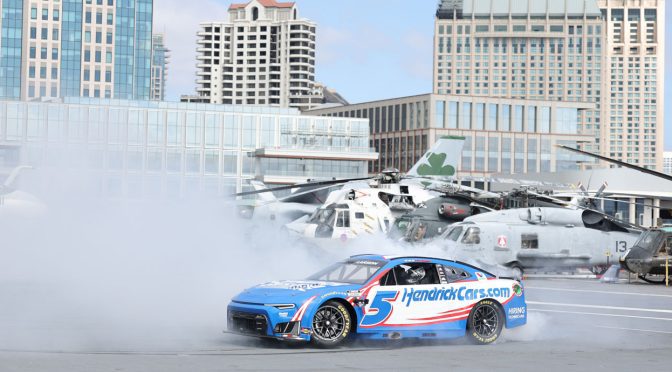 Kyle Larson revealed as cover driver for NASCAR 26 during live USS Midway event in San Diego