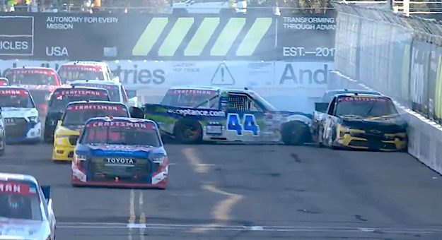 Rhodes triggers massive late crash in Turn 2