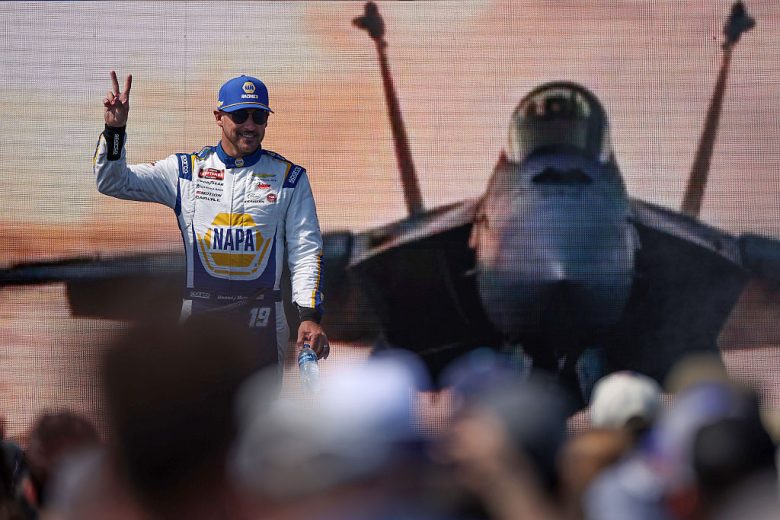 Daniel Hemric waves to fans.