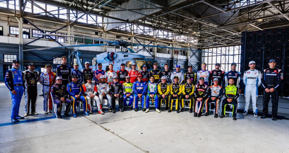 Drivers pose for a group photo at Naval Base Coronado.