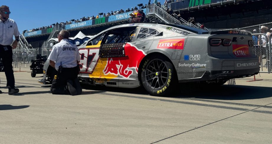 Shane van Gisbergen sits on pit road.