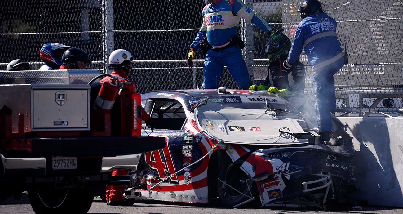 Sam Mayer exits his No. 41 Chevrolet after a major Turn 1 crash in the final stage at Naval Base Coronado