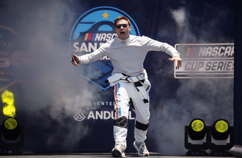 Scott Eastwood walks onstage during pre-race ceremonies.