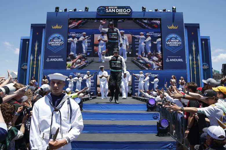 Brad Keselowski walks the stage.