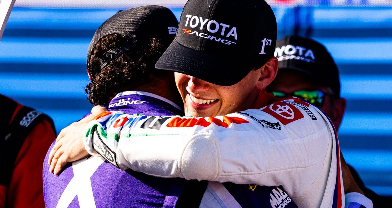 Bubba Wallace and Corey Heim share an embrace after Heim won at Naval Base Coronado.