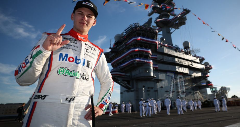 Corey Heim poses for a photo aboard the USS Carl Vinson at Naval Base Coronado.