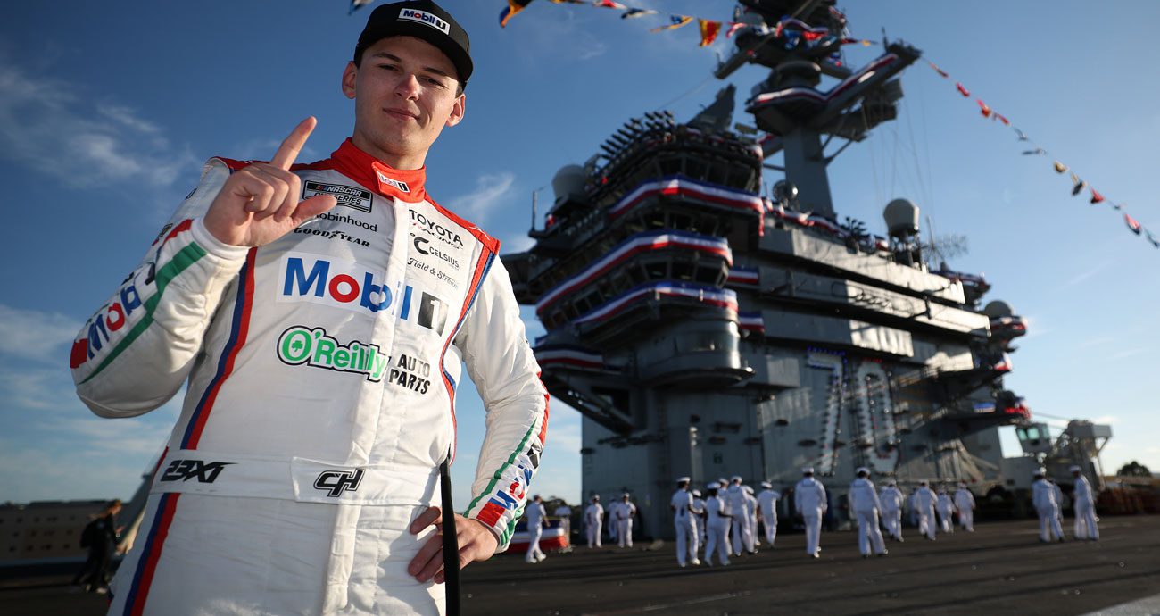 Corey Heim poses for a photo aboard the USS Carl Vinson at Naval Base Coronado.