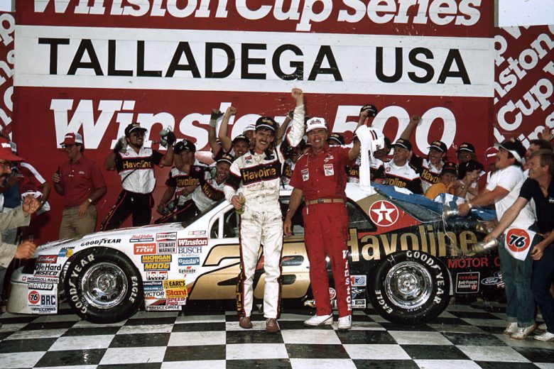 Davey Allison celebrates in Victory Lane at Talladega Superspeedway.