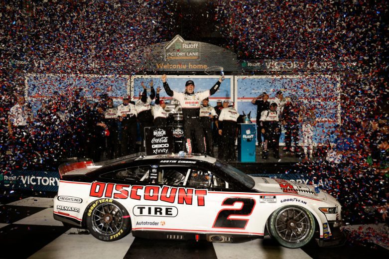 Austin Cindric celebrates in Victory Lane following his 2022 Daytona 500 win.
