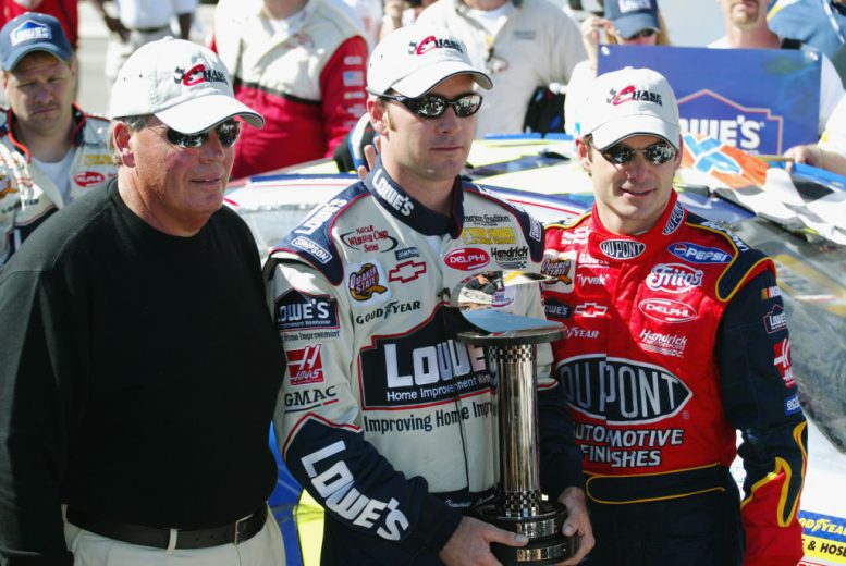 Rick Hendrick (L), Jimmie Johnson (C) and Jeff Gordon (R) pose for a photo.