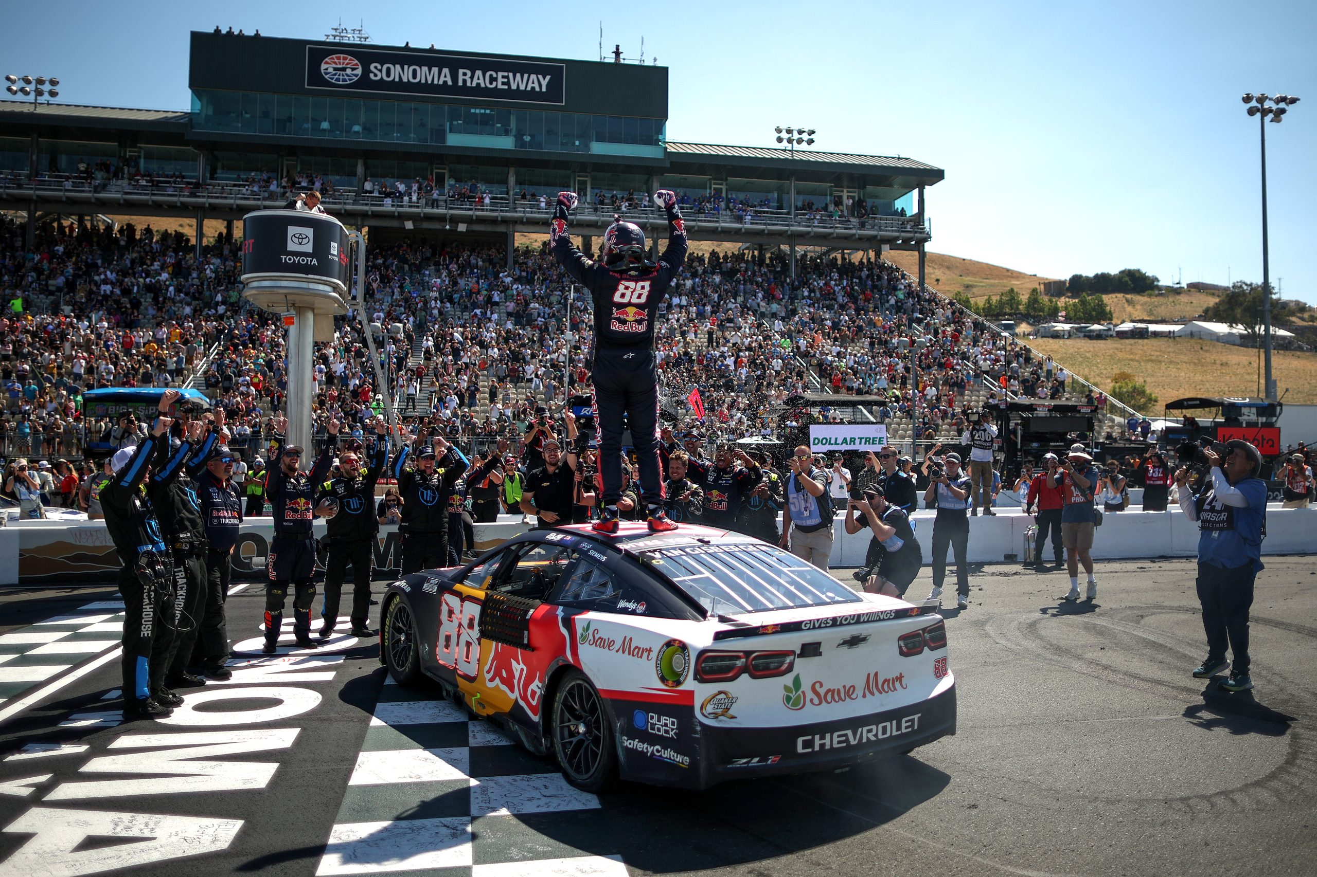 SONOMA, CALIFORNIA - JULY 13: Shane Van Gisbergen, driver of the #88 Red Bull Chevrolet, celebrates after winning the NASCAR Cup Series Toyota/Save Mart 350 at Sonoma Raceway on July 13, 2025 in Sonoma, California.