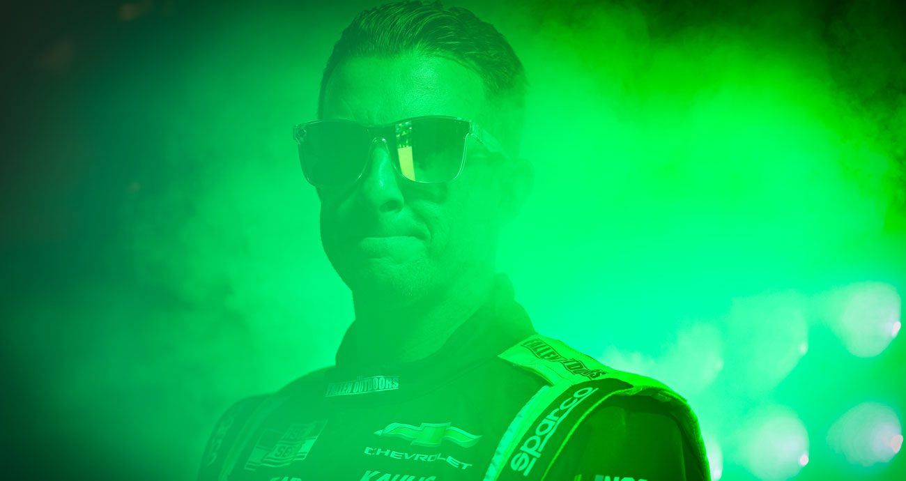 AJ Allmendinger looks on before a NASCAR Cup Series race.