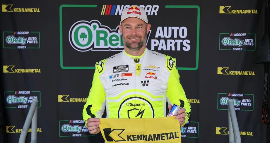 Shane van Gisbergen celebrates after winning the pole at Sonoma.