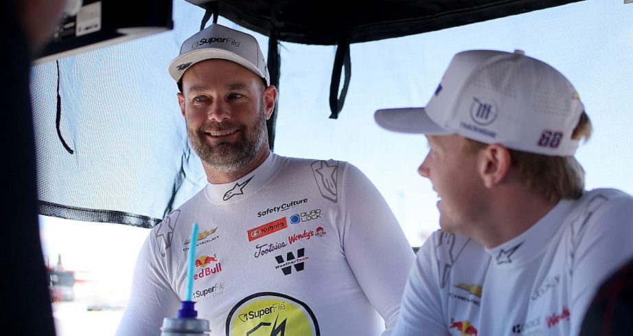 Shane van Gisbergen and Connor Zilisch look on.