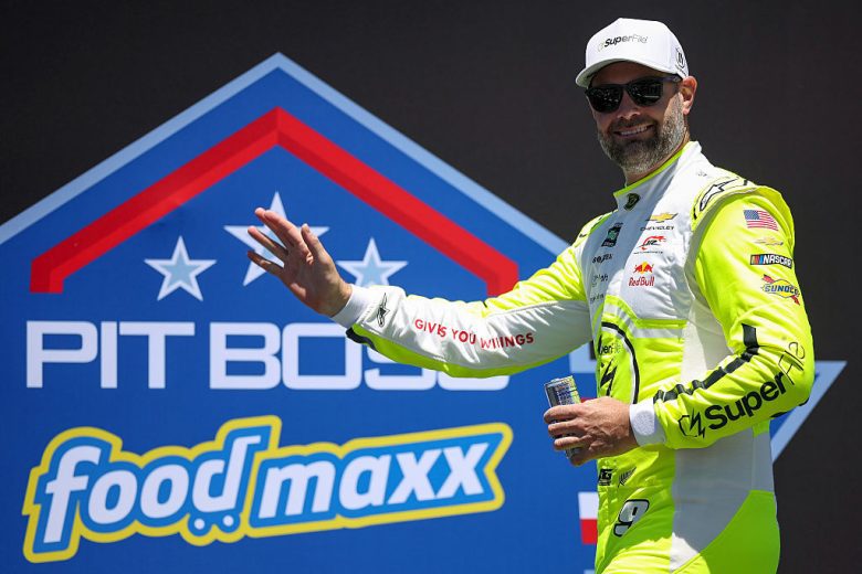 Shane van Gisbergen waves to fans.