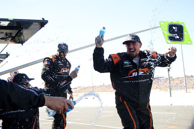 JR Motorsports crew members celebrate.