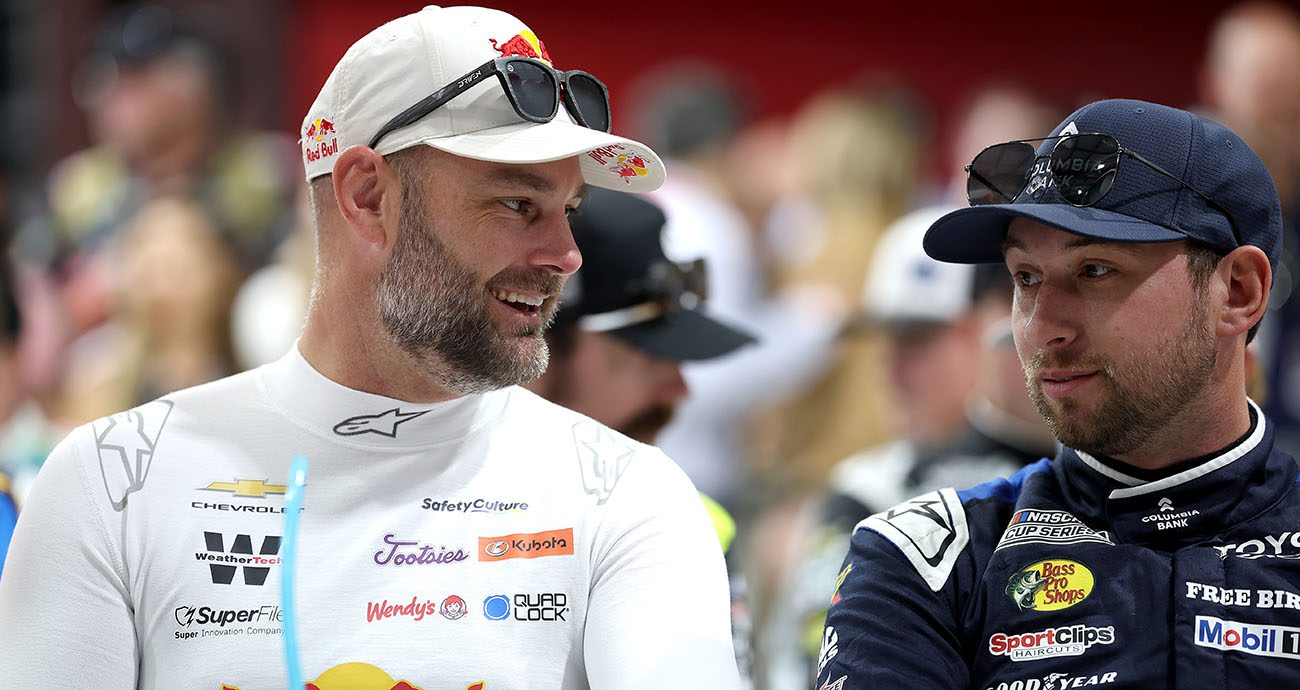 shane van gisergen and chase briscoe in the sonoma drivers meeting