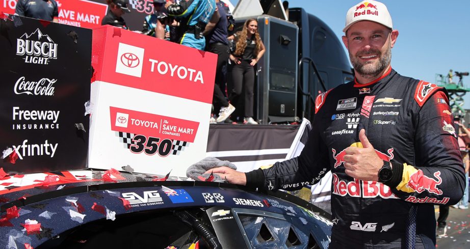 Shane van Gisbergen puts the winner sticker on his No. 97 Trackhouse Racing Chevrolet at Sonoma Raceway.