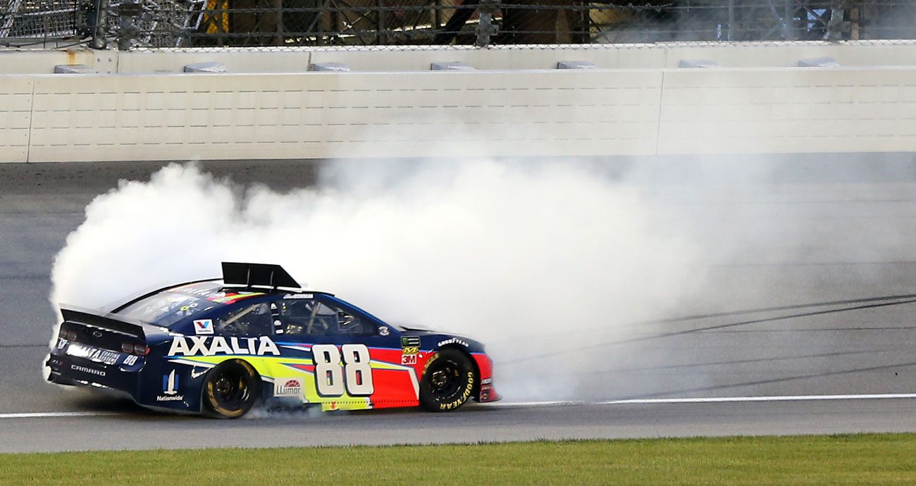 Alex Bowman performs a burnout after winning a NASCAR Cup Series race at Chicagoland in 2019.