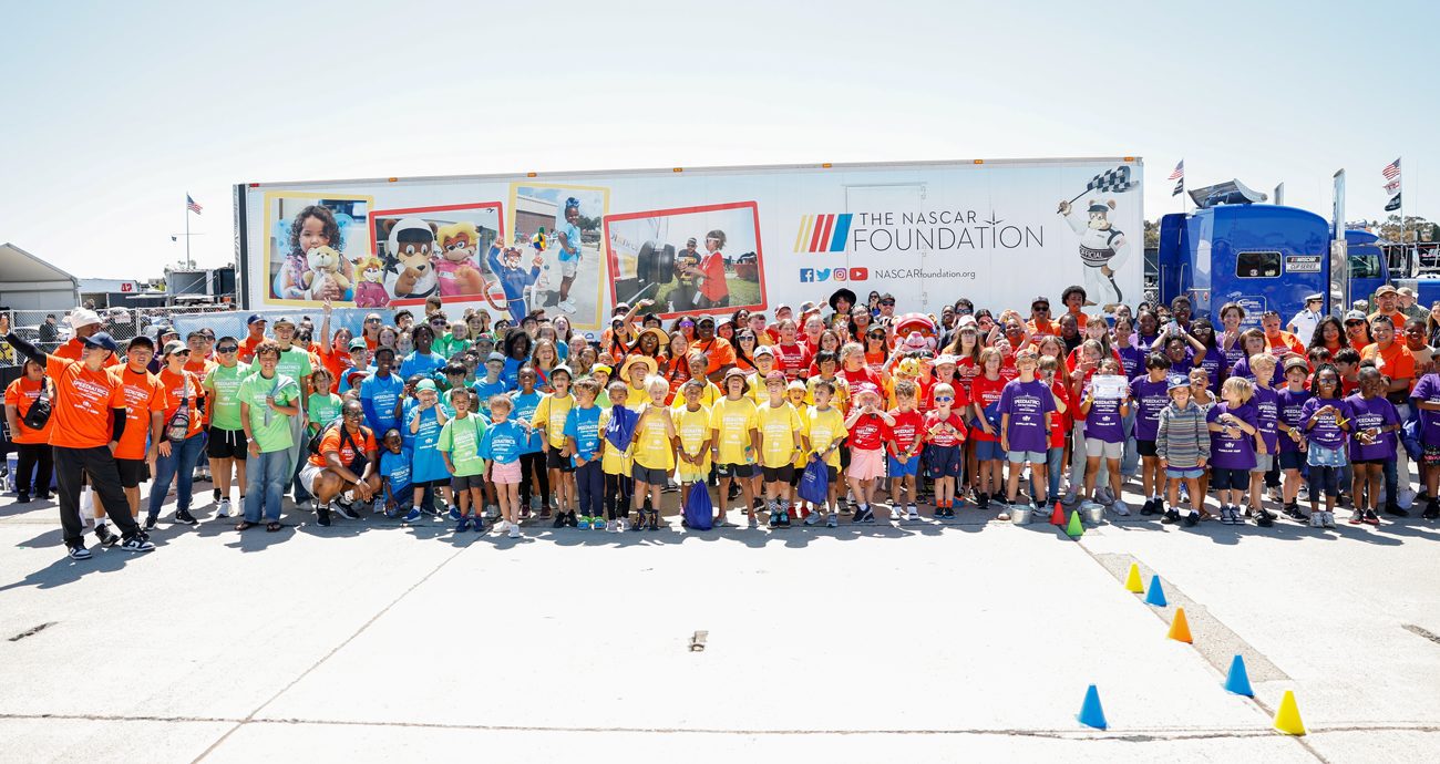 Group shot of The NASCAR Foundation's Spediatrics Fun Day Festival at Naval Base Coronado.