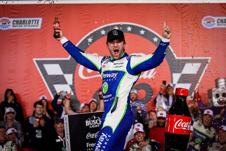 Daniel Suárez celebrates in Victory Lane.