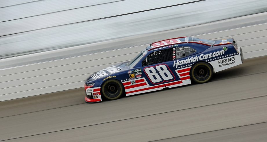Cars drive at Chicagoland Speedway.