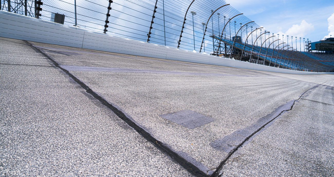 An up-close look at a worn patch of pavement at Chicagoland Speedway.