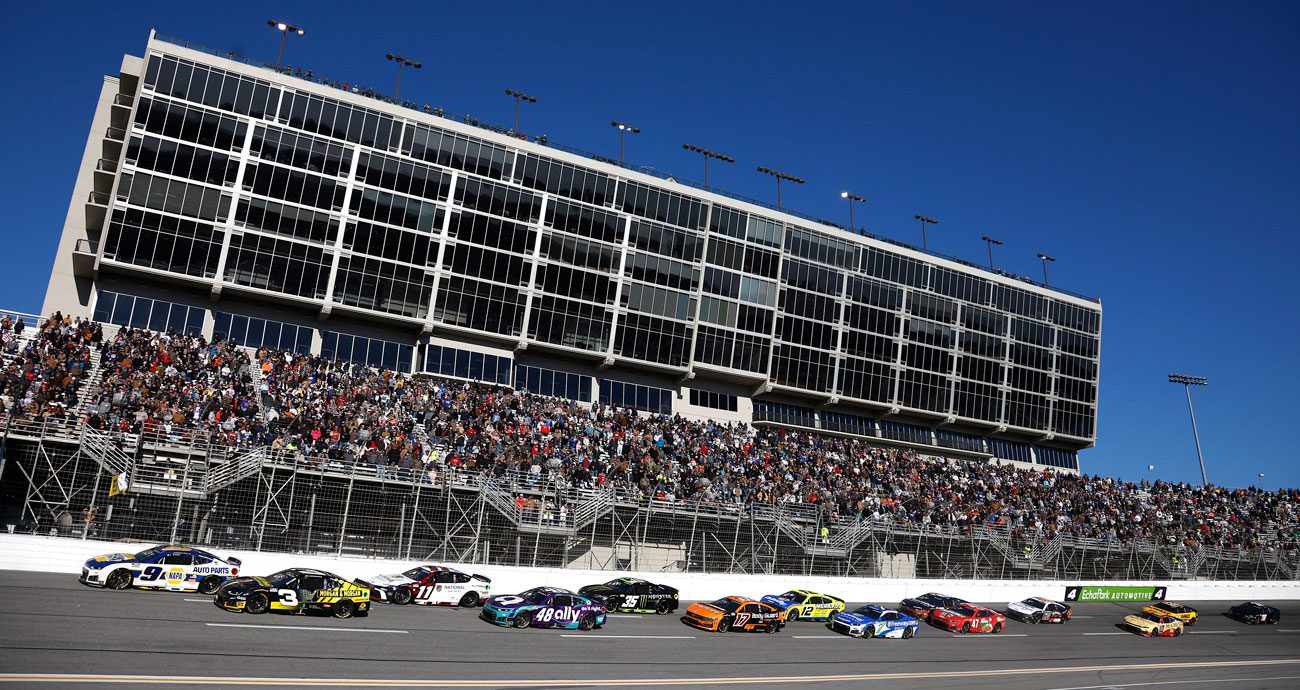 NASCAR Cup Series cars race at EchoPark Speedway.
