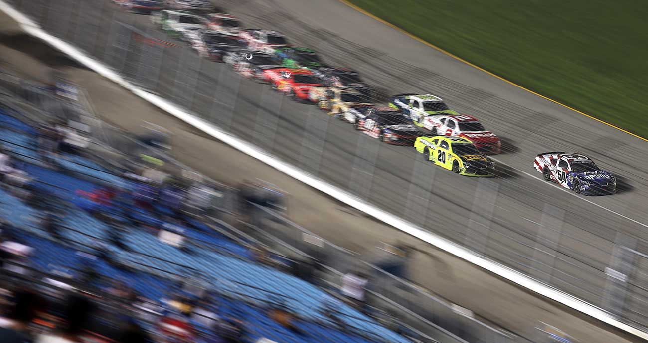 Taylor Gray's No. 54 Toyota leads the way on the frontstretch during O'Reilly Auto Parts Series action at Chicagoland Speedway