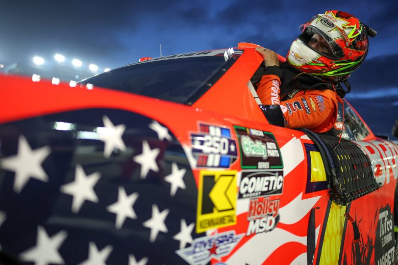 Justin Allgaier climbs in car.