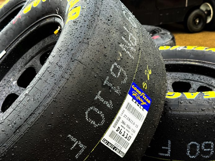 View of wet tires at track.